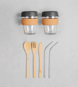 Reusable coffee cups, bamboo cutlery and steel straws