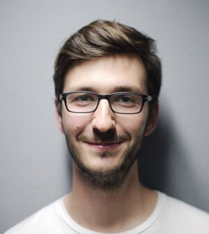 Smiling man wearing glasses